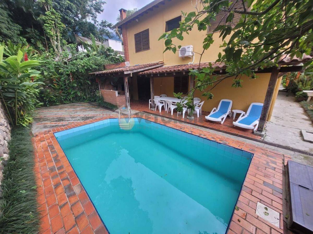Casa com 5 dormitórios à venda por R$ 2.000.000 - Em condominio fechado na praia Toque Toque Pequeno - São Sebastião/SP - Rafael Melo